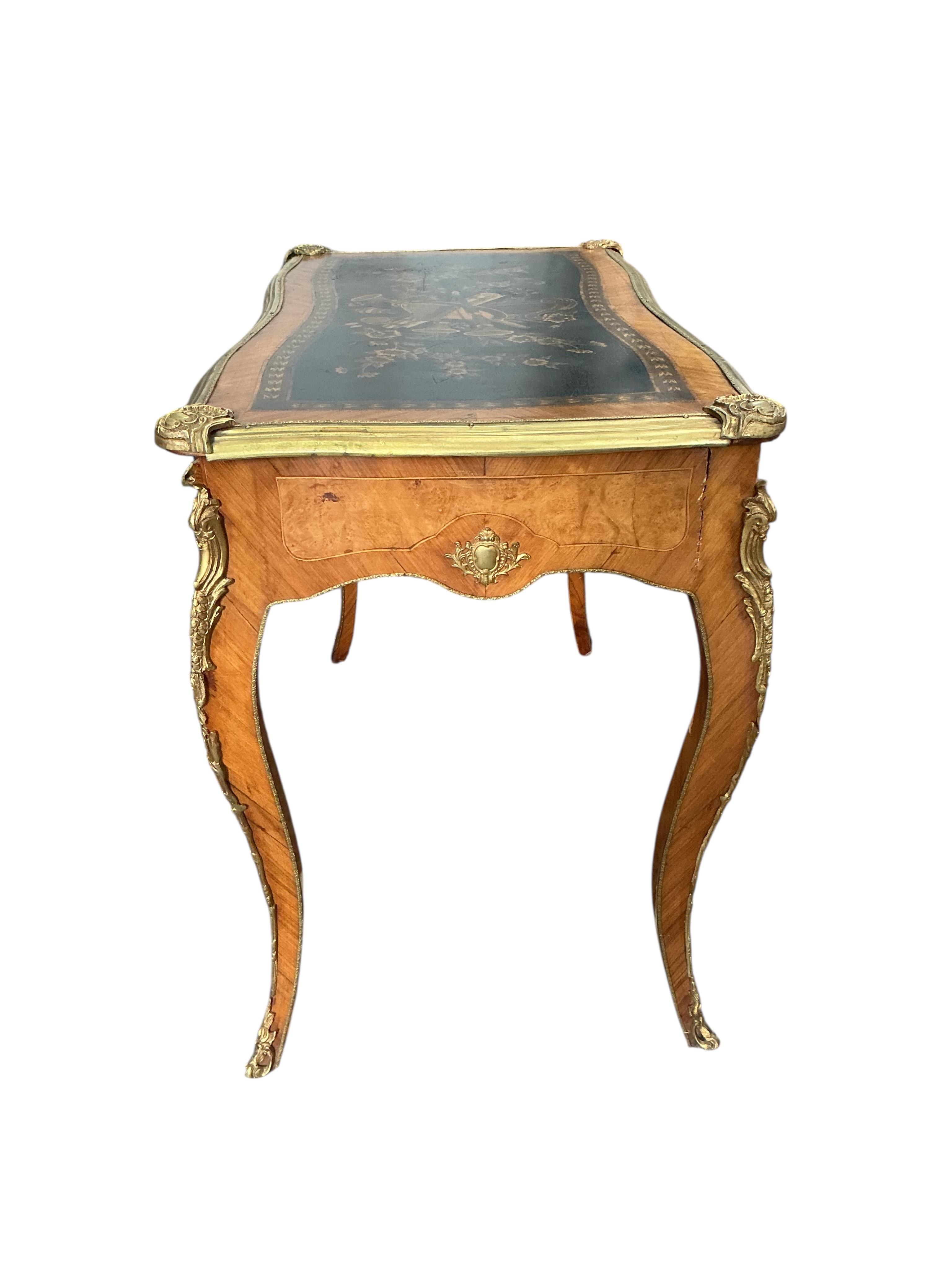 A Louis XVI style gilt metal mounted kingwood bureau plat, width 102cm, depth 55cm, height 80cm